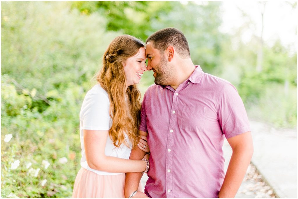 engaged couple fiancé engagement session beach port burwell ontario