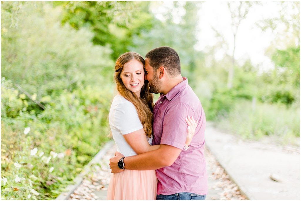 engaged couple fiancé engagement session beach port burwell ontario