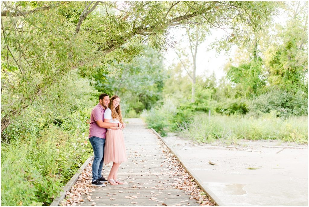 engaged couple fiancé engagement session beach port burwell ontario