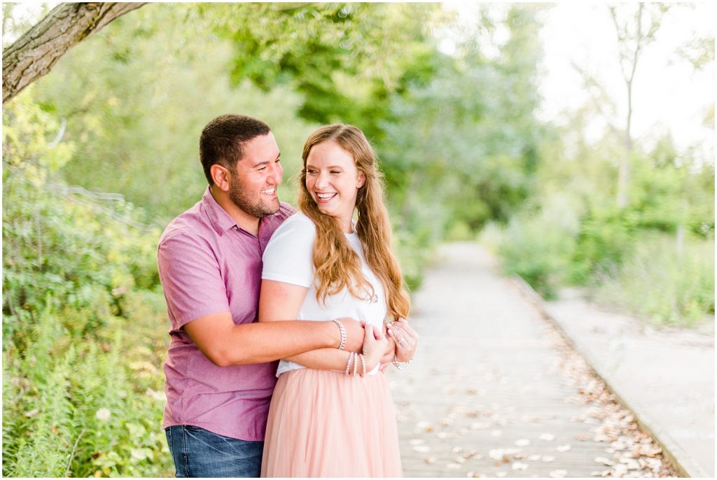 engaged couple fiancé engagement session beach port burwell ontario