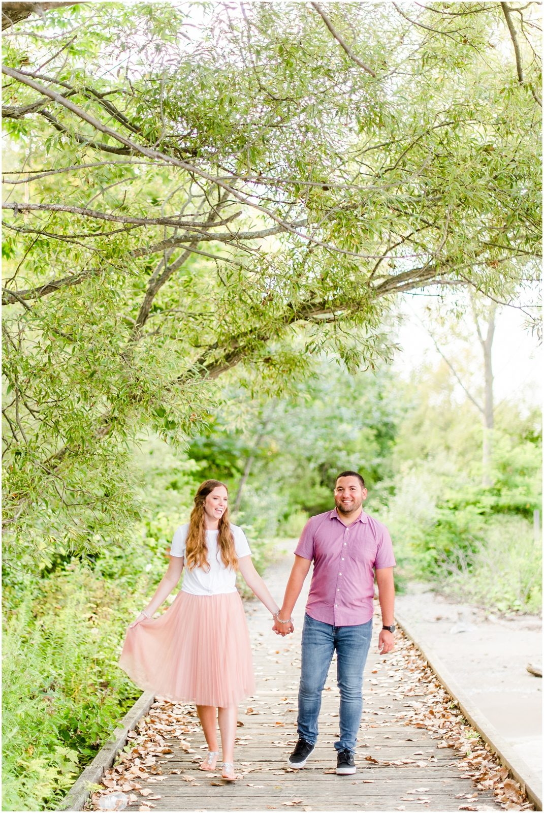 engaged couple fiancé engagement session beach port burwell ontario