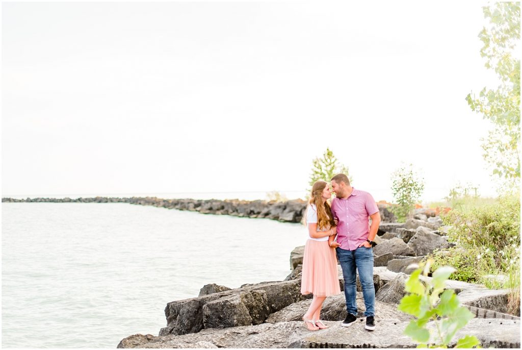 engaged couple fiancé engagement session beach port burwell ontario