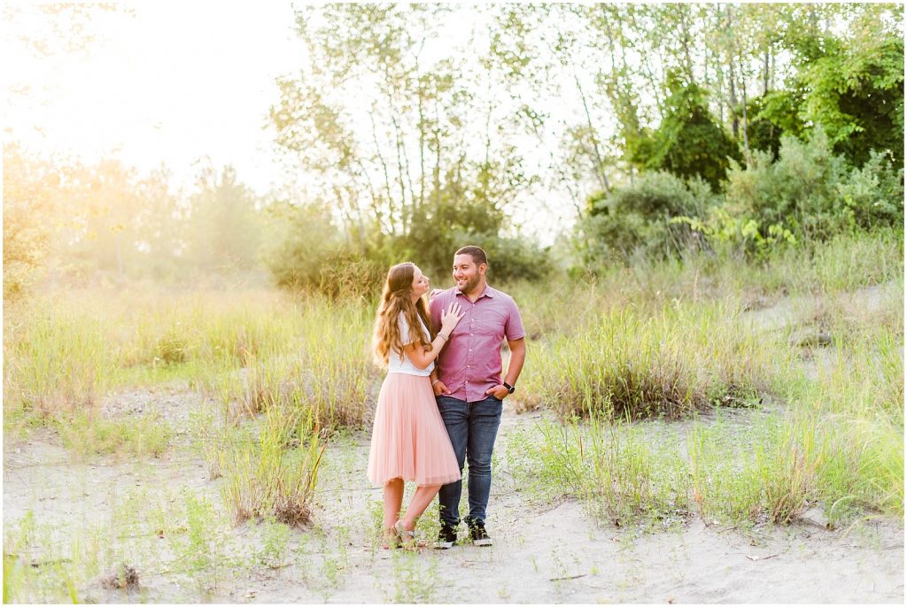 engaged couple fiancé engagement session beach port burwell ontario