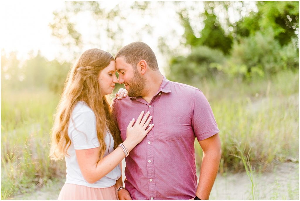 engaged couple fiancé engagement session beach port burwell ontario