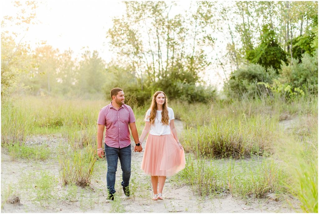 engaged couple fiancé engagement session beach port burwell ontario