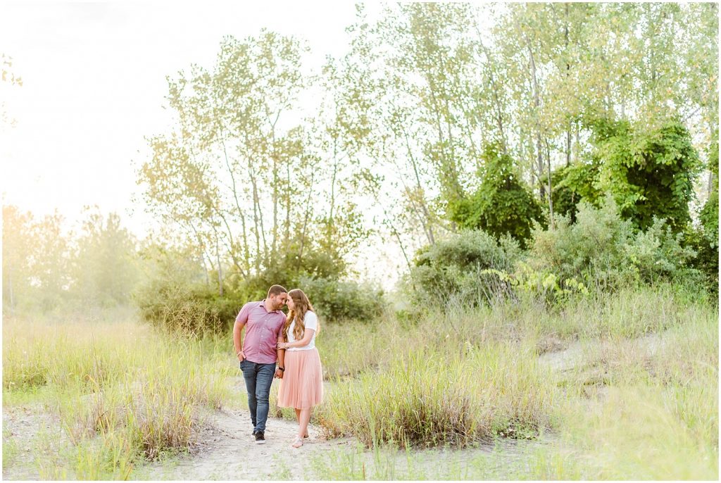 engaged couple fiancé engagement session beach port burwell ontario