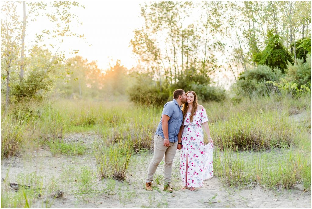 engaged couple fiancé engagement session beach port burwell ontario