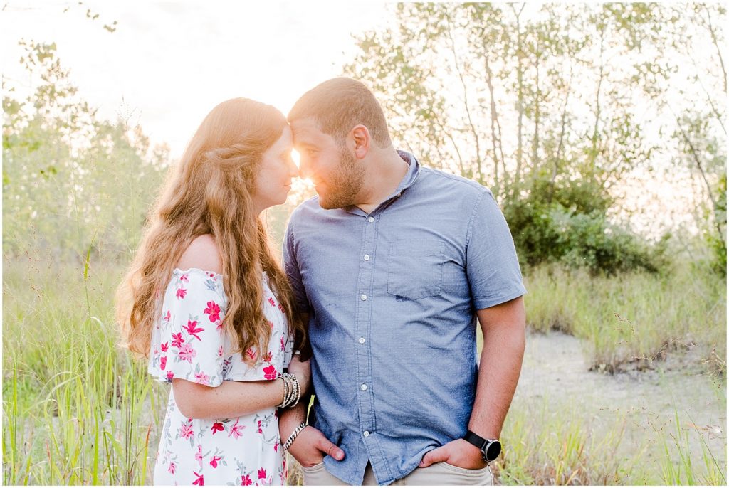 engaged couple fiancé engagement session beach port burwell ontario