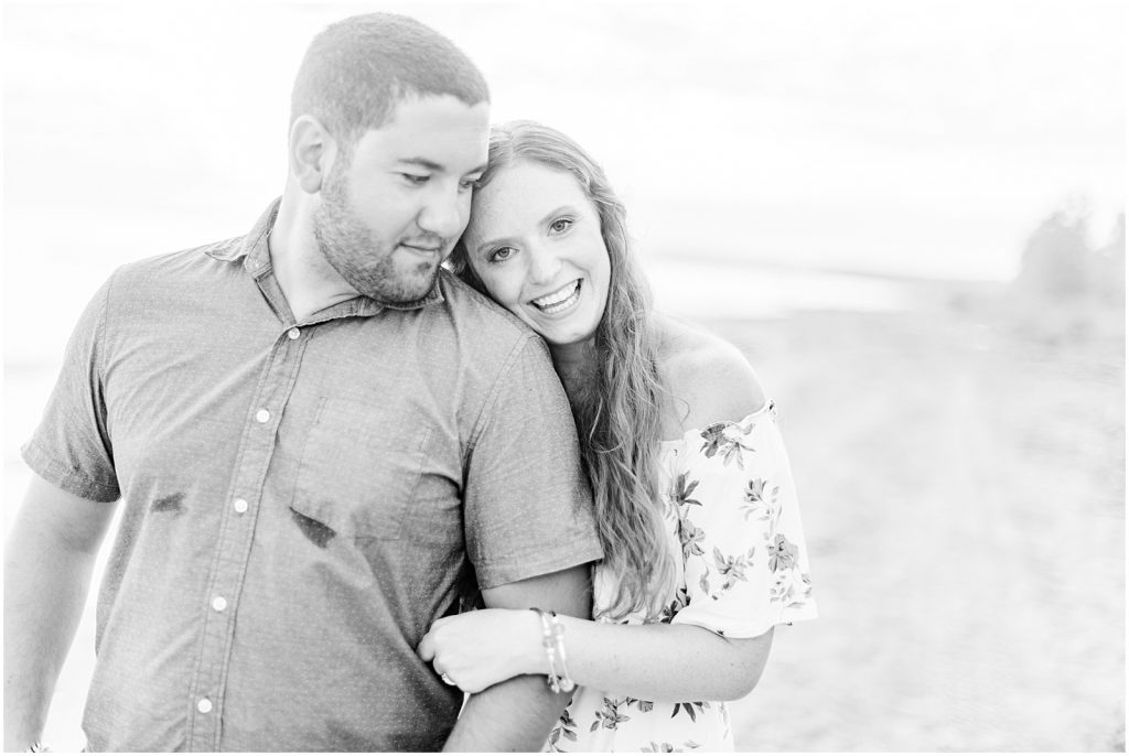 engaged couple fiancé engagement session beach port burwell ontario