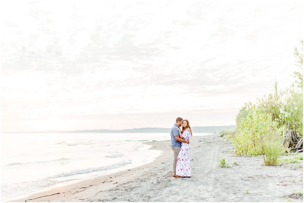 engaged couple fiancé engagement session beach port burwell ontario