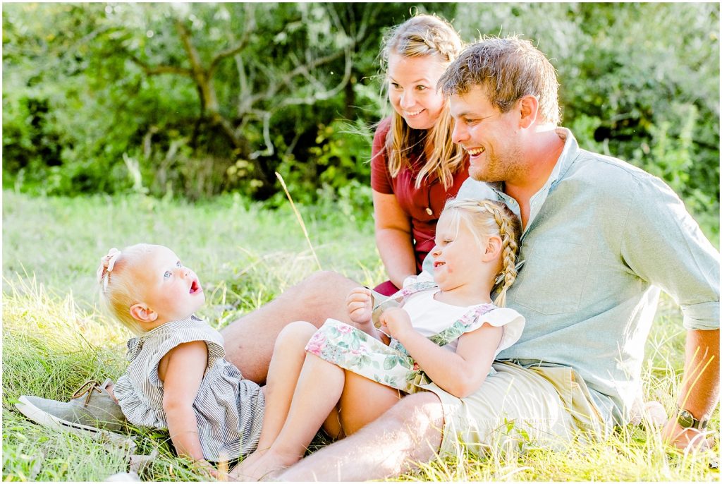 grand river bank brant conservation brantford family session sitting in grass