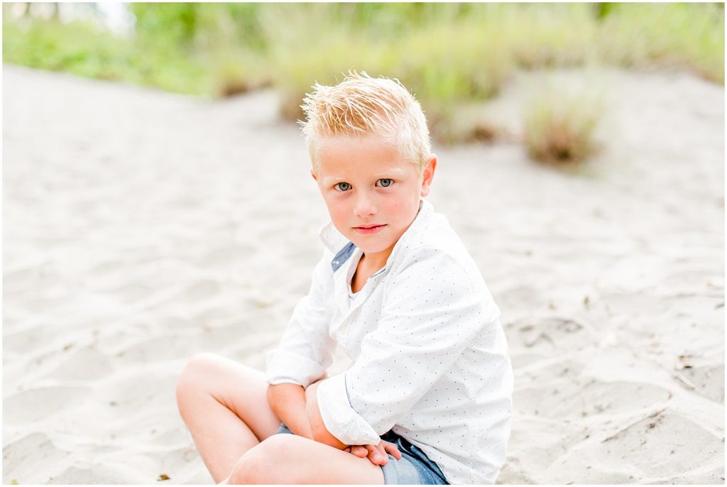 lake erie long point beach family session boy sitting