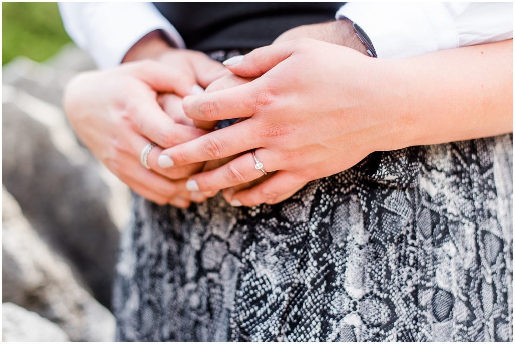 Spencer Gorge Engagement Session couple snuggling on bridge