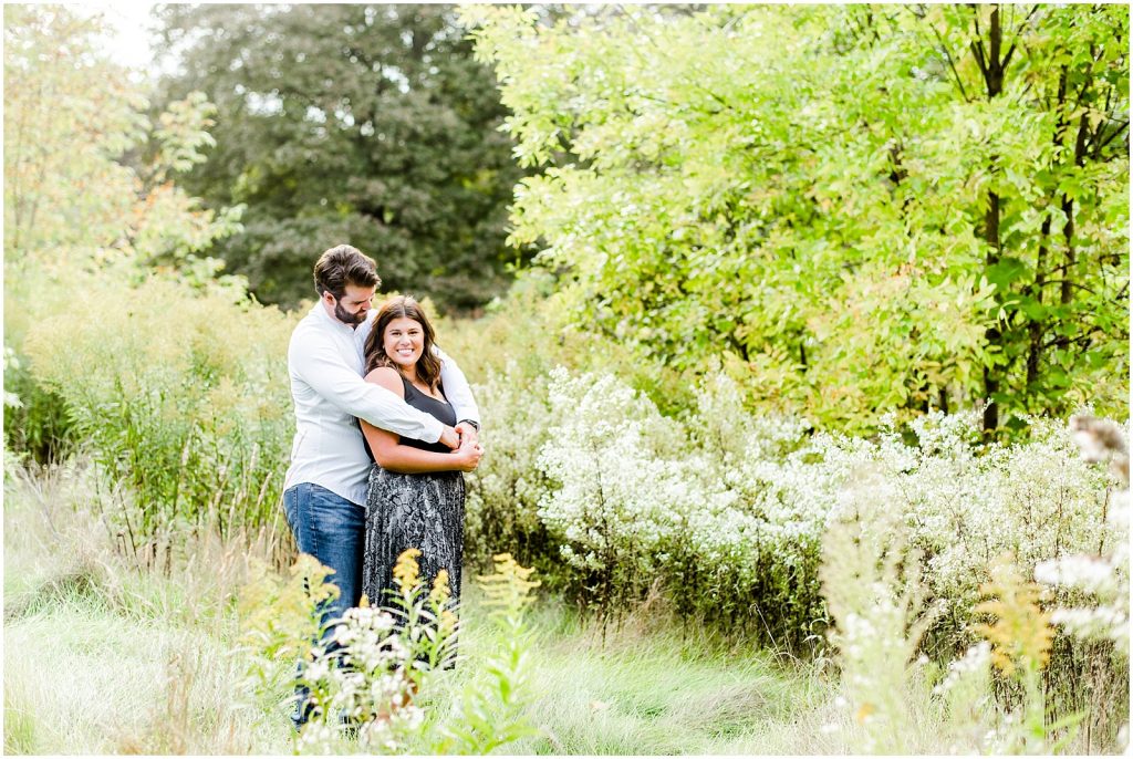 Spencer Gorge Engagement Session couple snuggling in goldenrod