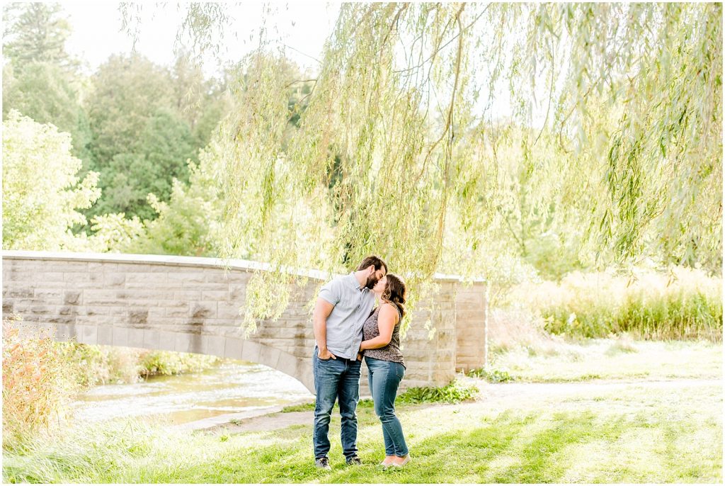 Spencer Gorge Engagement Session couple walking under willow tree