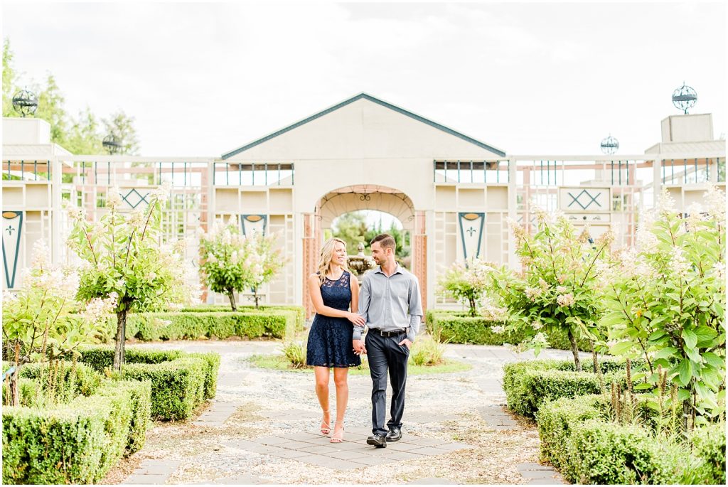 whistling gardens engagement session fiance couple walking