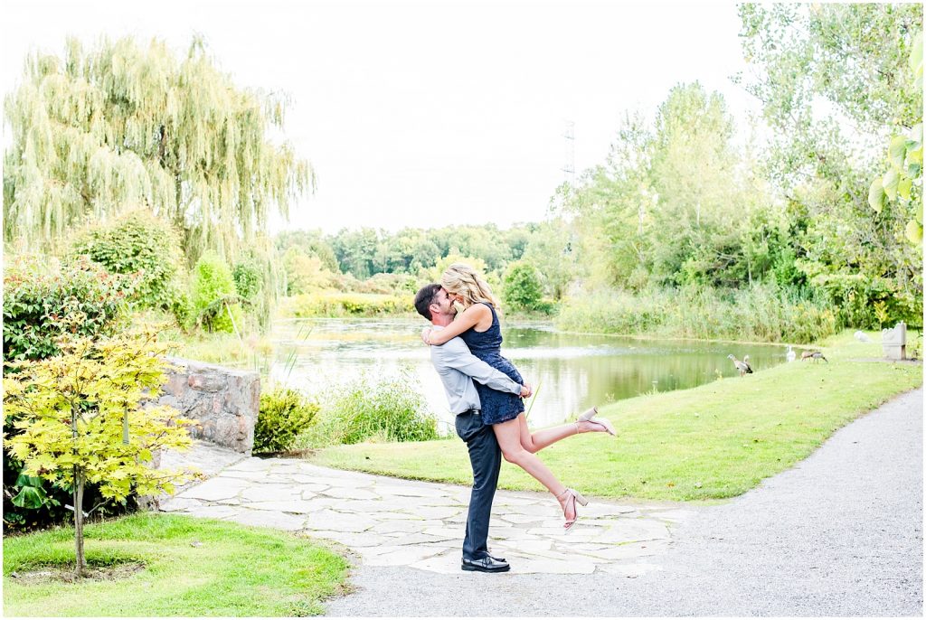 whistling gardens engagement session fiance couple kissing