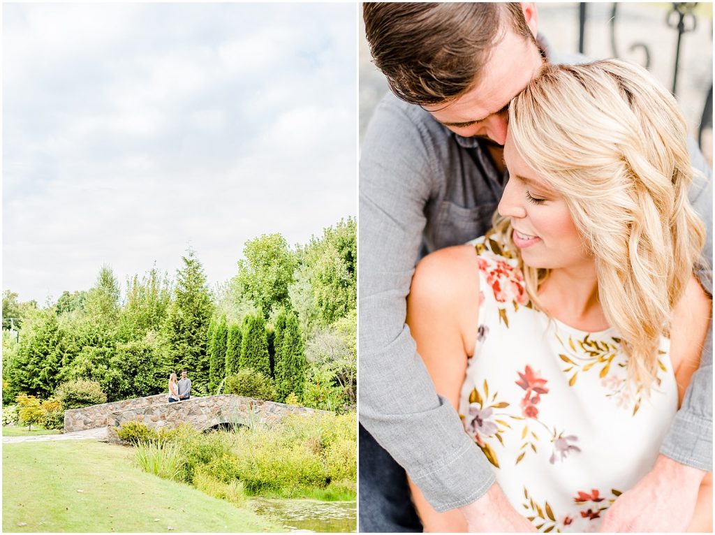 whistling gardens engagement session fiance couple snuggling and on bridge