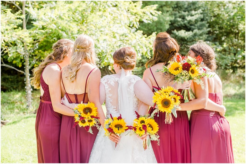 St. Mary's Countryside Wedding bride and bridesmaids hugging