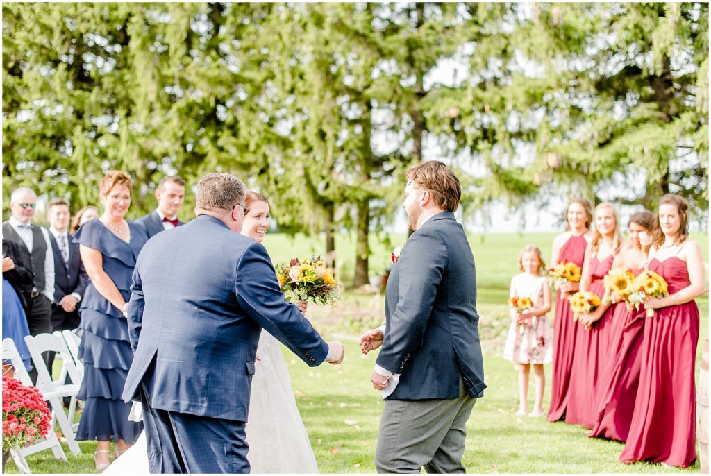 St. Mary's Countryside Wedding bride and groom meet at the end of aisle