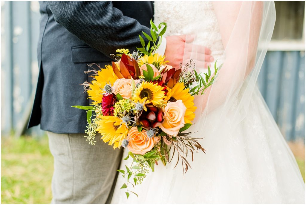 St. Mary's Countryside Wedding bride and groom holding bouquet