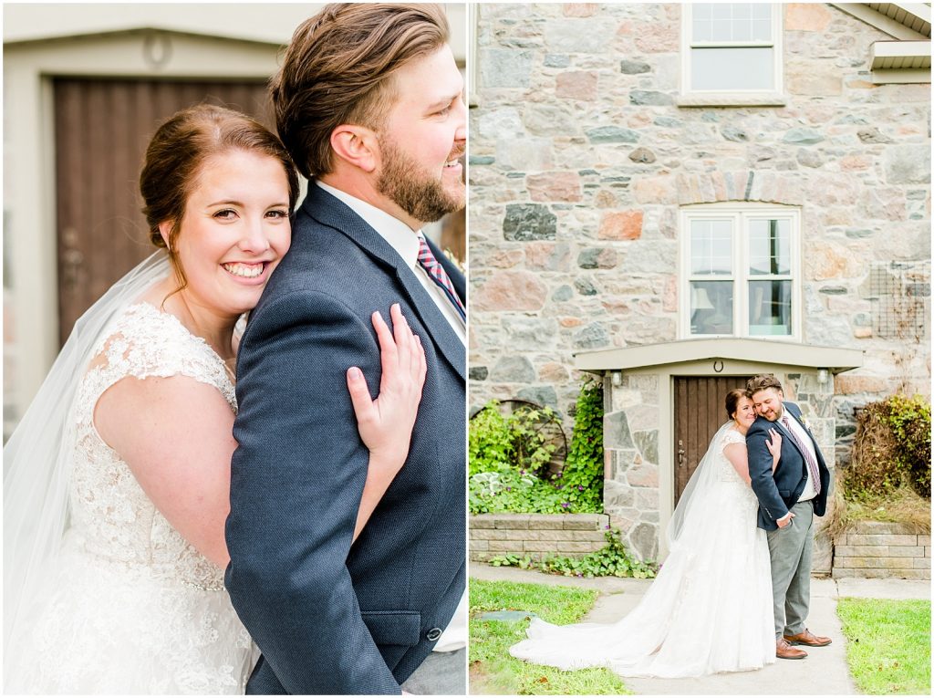 St. Mary's Countryside Wedding bride and groom in front of stone house