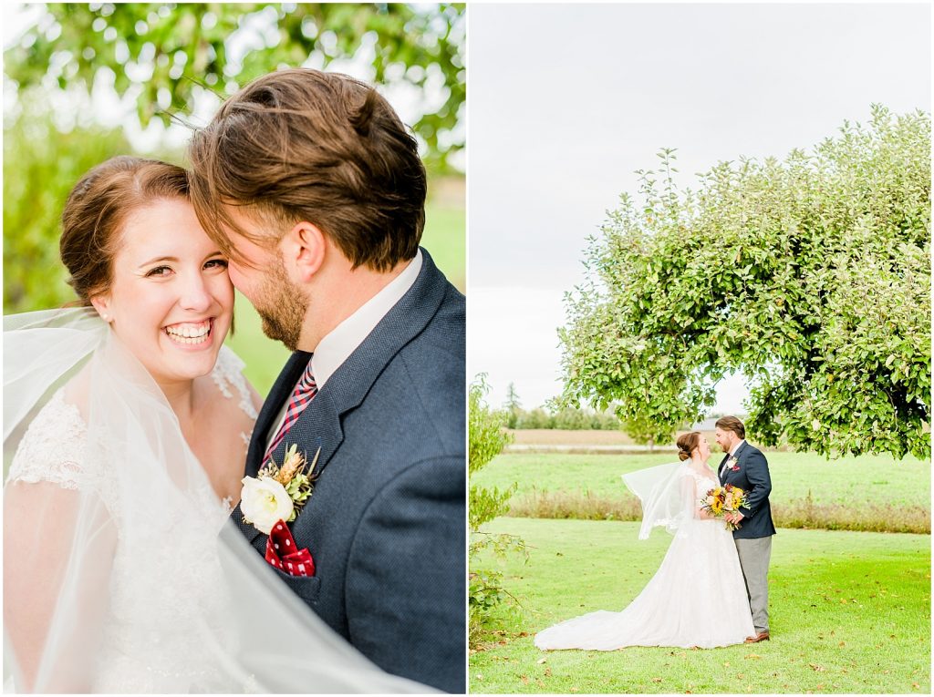 St. Mary's Countryside Wedding bride and groom in front of apple tree with veil