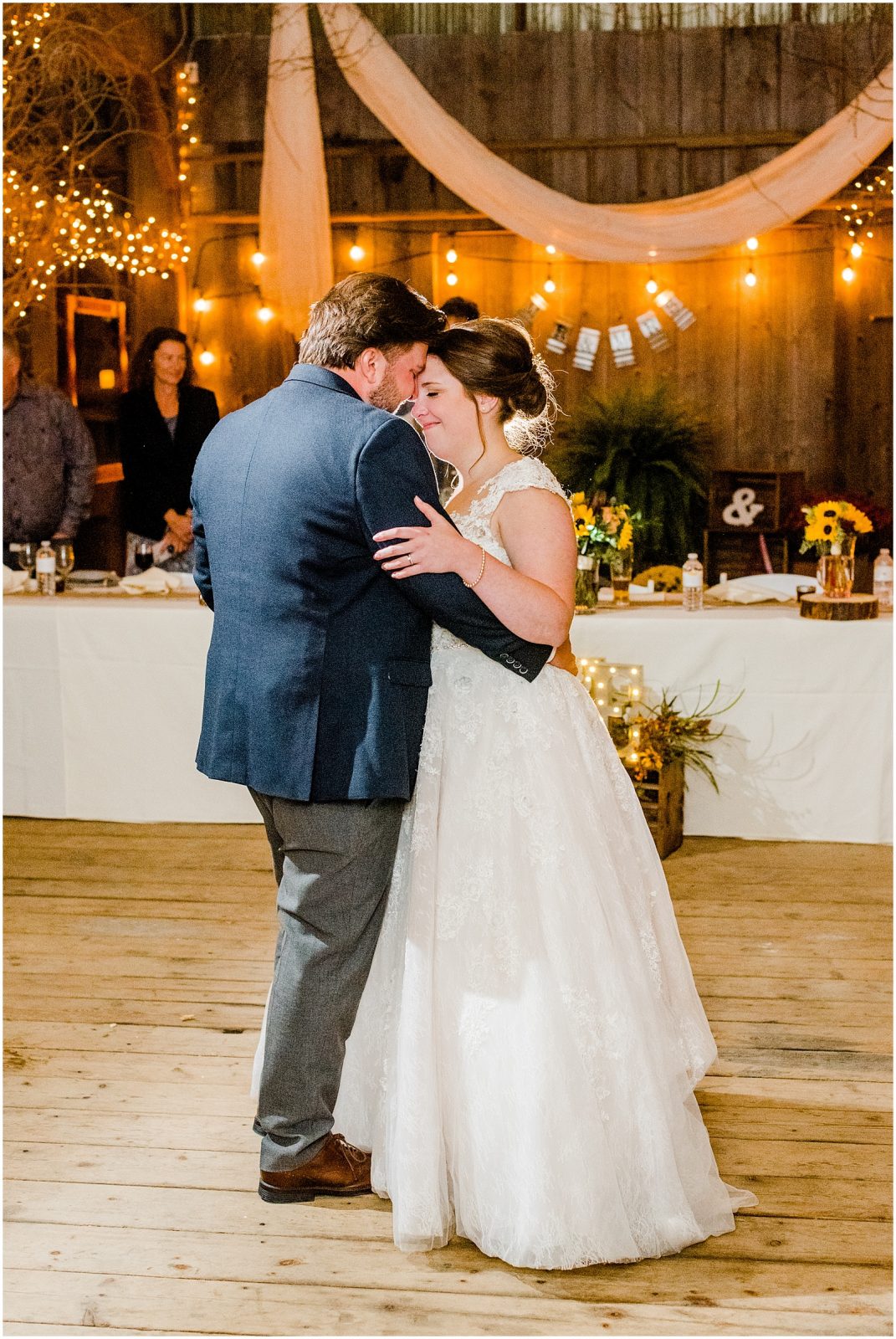 St. Mary's Countryside Wedding bride and groom first dance in a barn