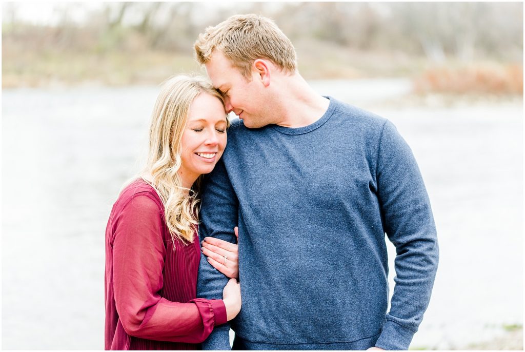 Lorne Park Brantford Grand River Engagement Session couple snuggling