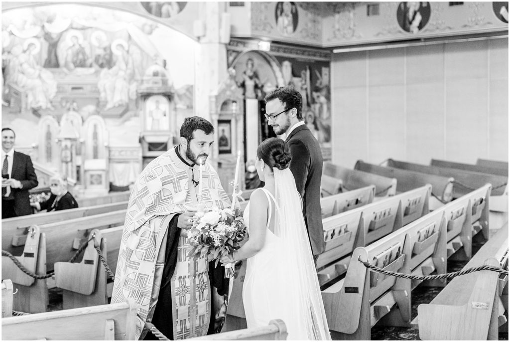 Burnaby Vancouver Wedding Priest prepares couple for walk up the aisle