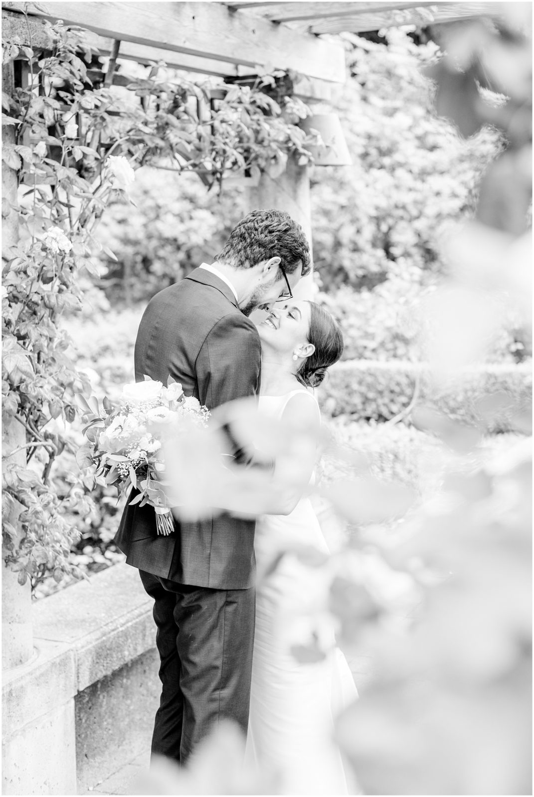 Burnaby Vancouver Wedding Black and White photo of Bride and Groom kissing