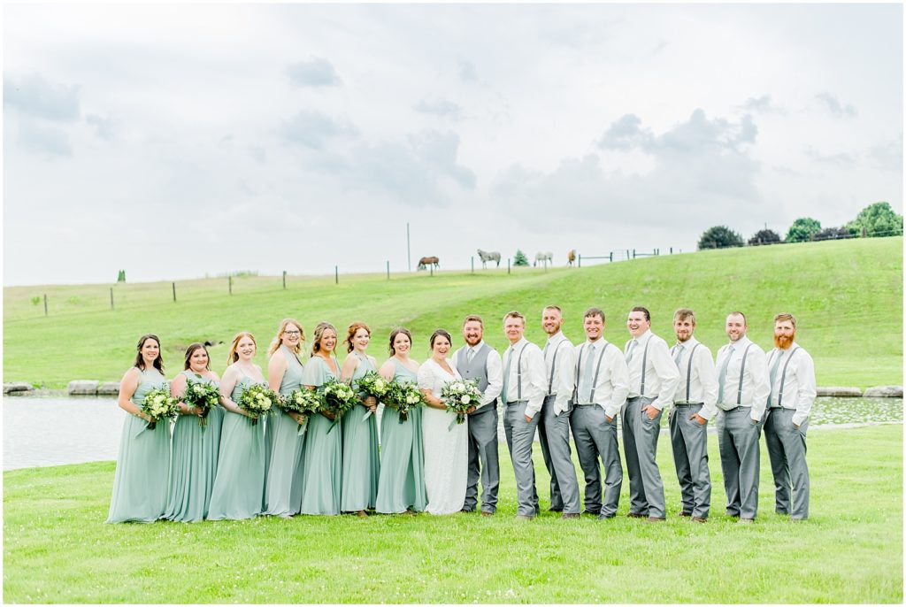 Princeton backyard wedding large wedding party in horse field