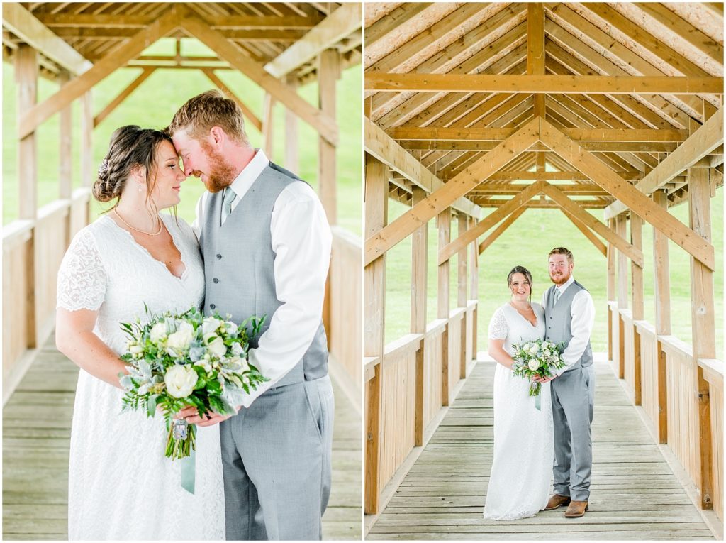 Princeton backyard wedding bride and groom snuggle and laugh on covered country bridge