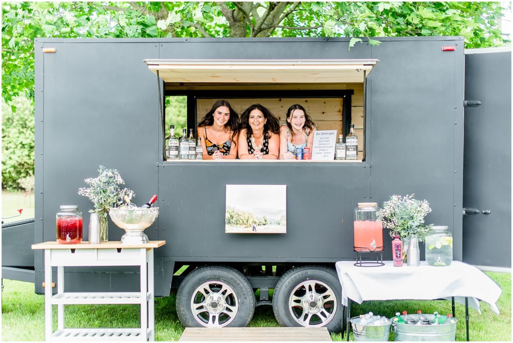 Princeton backyard wedding drinks trailer with servers