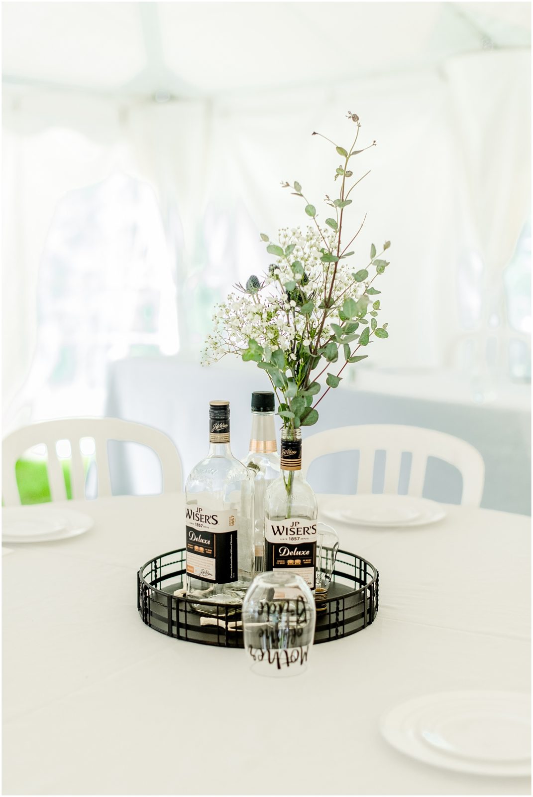 Princeton backyard wedding tent reception table centerpiece