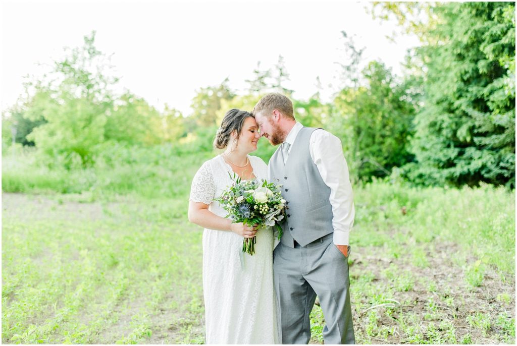 Princeton backyard wedding bride and groom at golden hour in country field