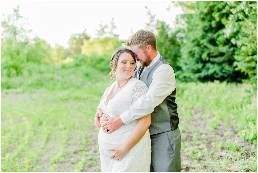 Princeton backyard wedding bride and groom at golden hour in country field