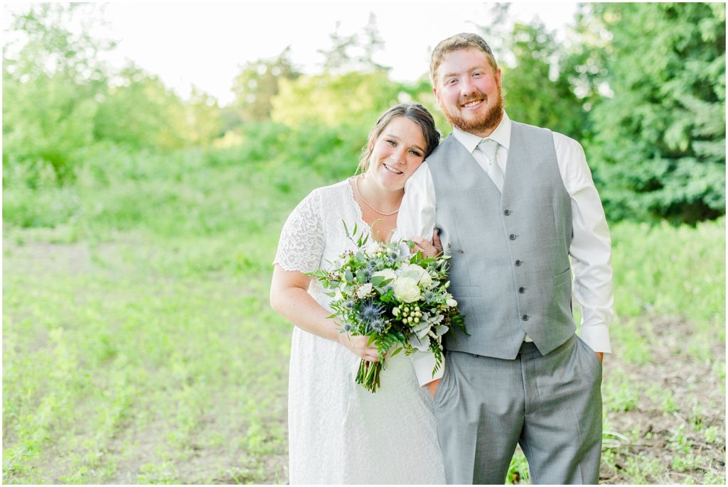 Princeton backyard wedding bride and groom at golden hour in country field