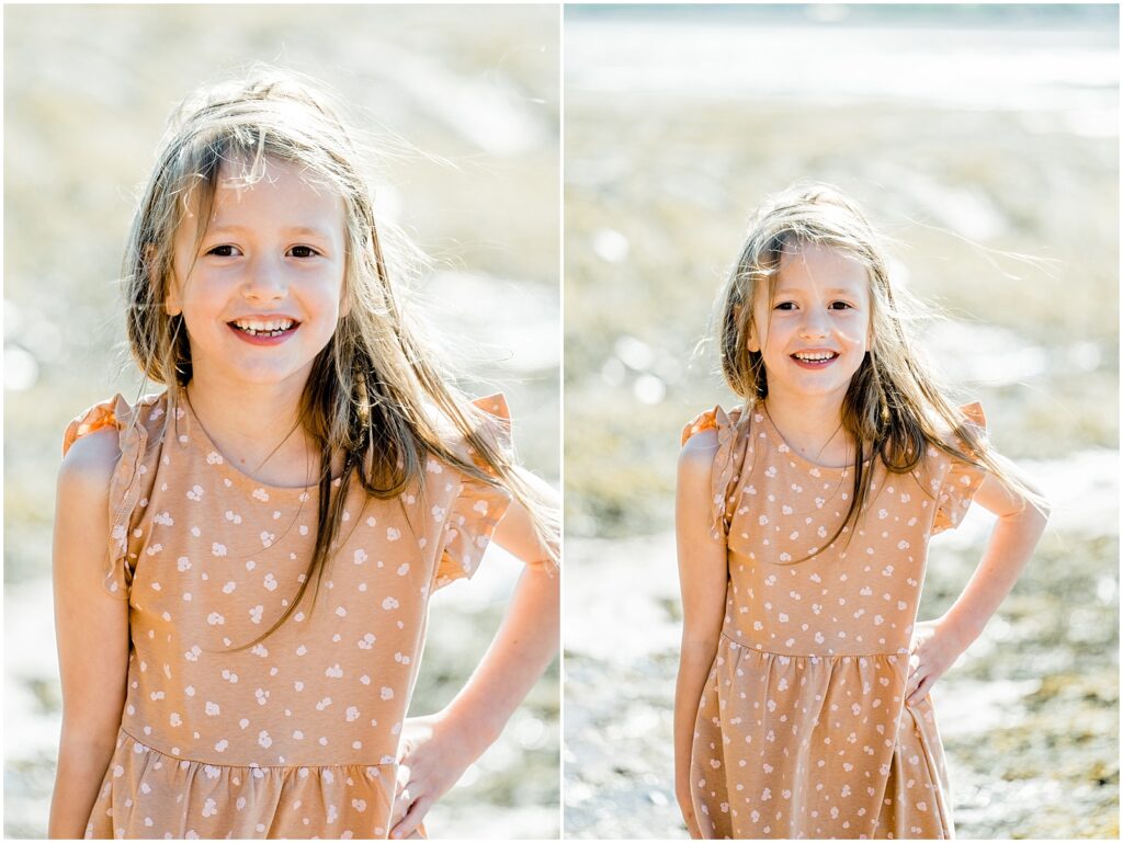 little girl smiling with her hand on her hip 