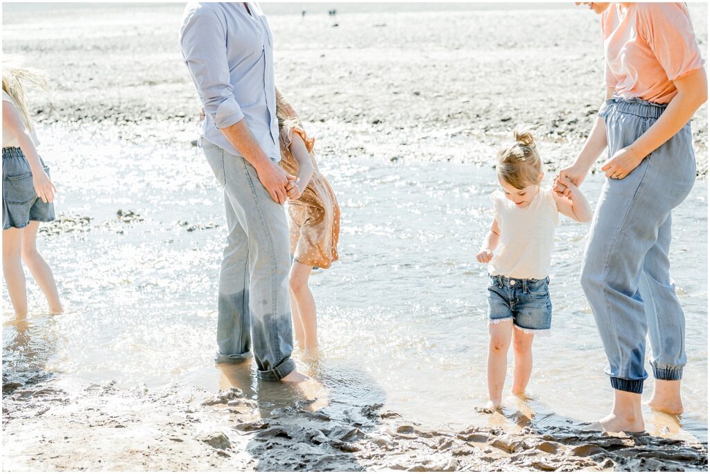 Saint Martins Portrait Session family standing together on the shore