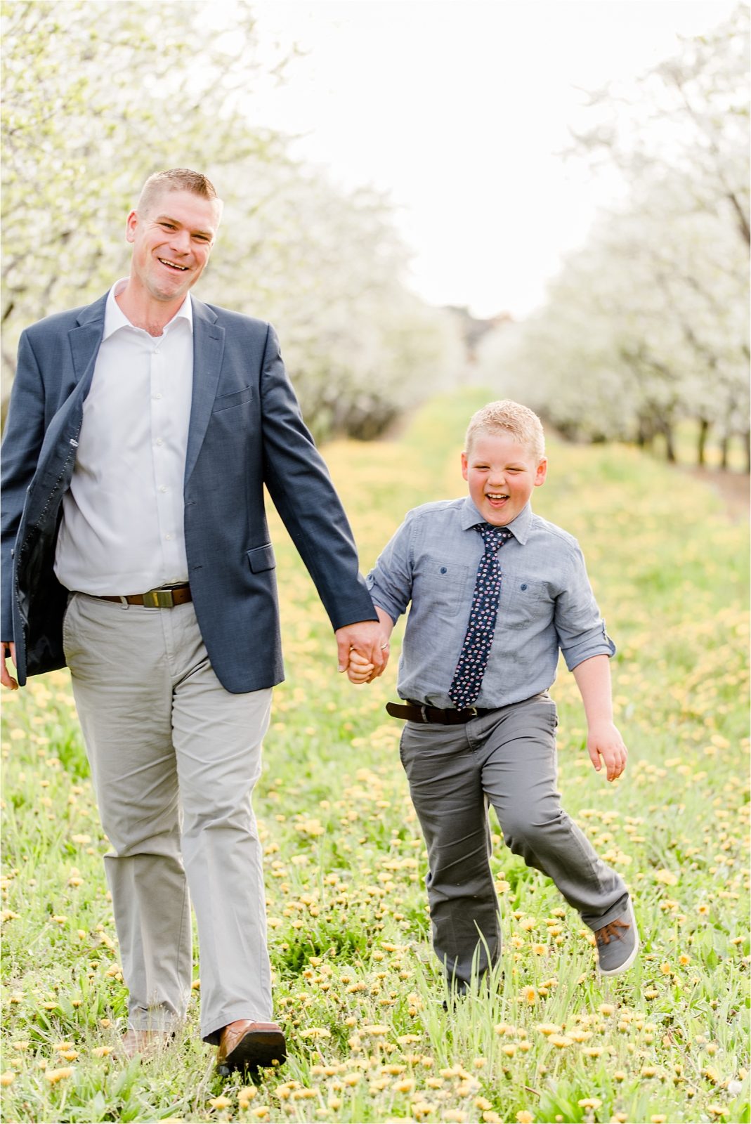 Cherry farm father son walking laughing