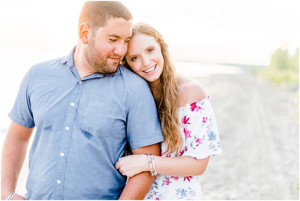 engaged couple fiancé engagement session beach port burwell ontario