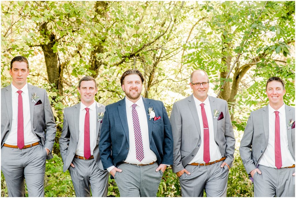 St. Mary's Countryside Wedding groom and groomsmen laughing
