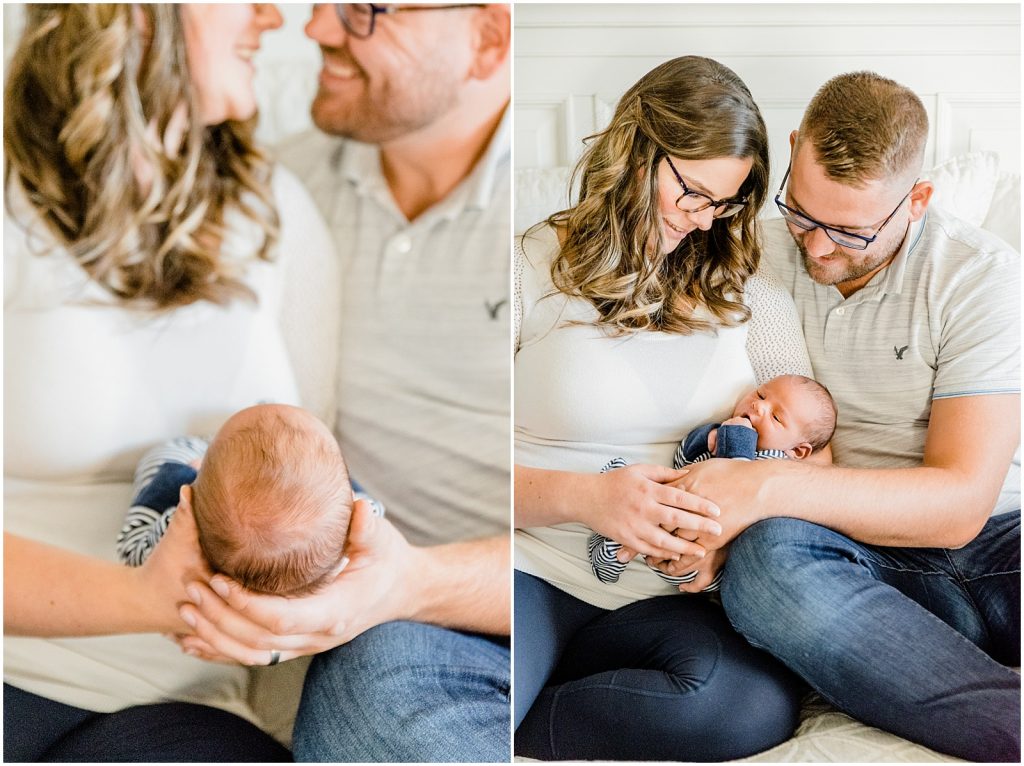 ancaster hamilton lifestyle newborn session baby with mom and dad on bed