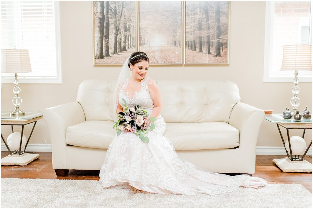 firerock golf course wedding bride on couch with bouquet