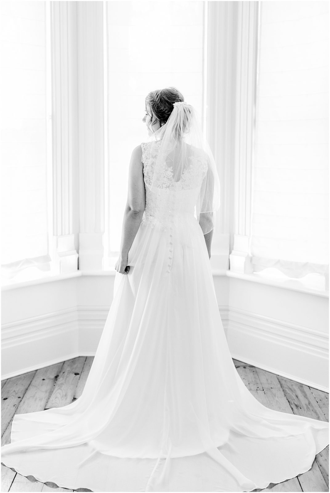 oxford country countryside wedding bride standing in bay window