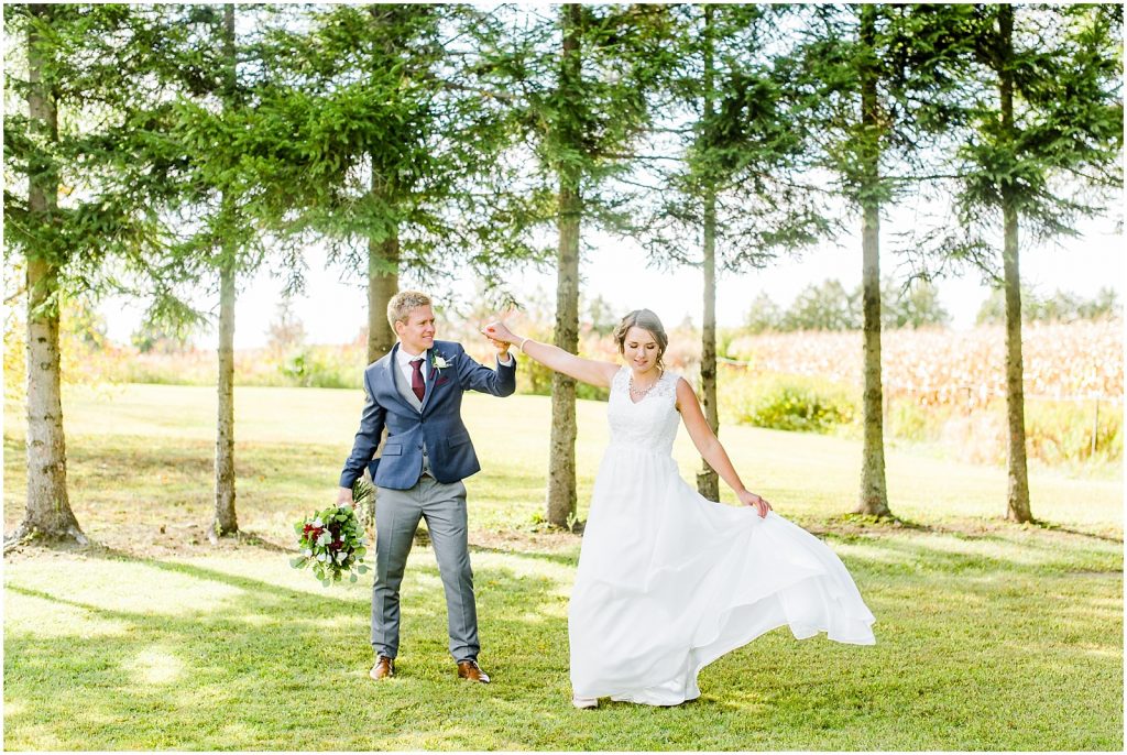 oxford country countryside wedding bride and groom dancing in front of the trees
