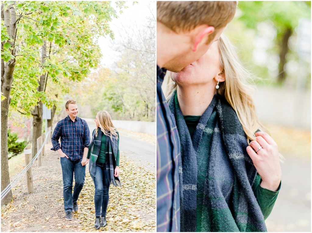 Lorne Park Brantford Engagement Session couple walking and kissing in the fall leaves