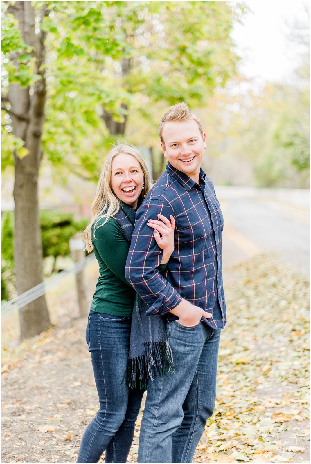 Lorne Park Brantford Engagement Session couple laughing in the fall leaves