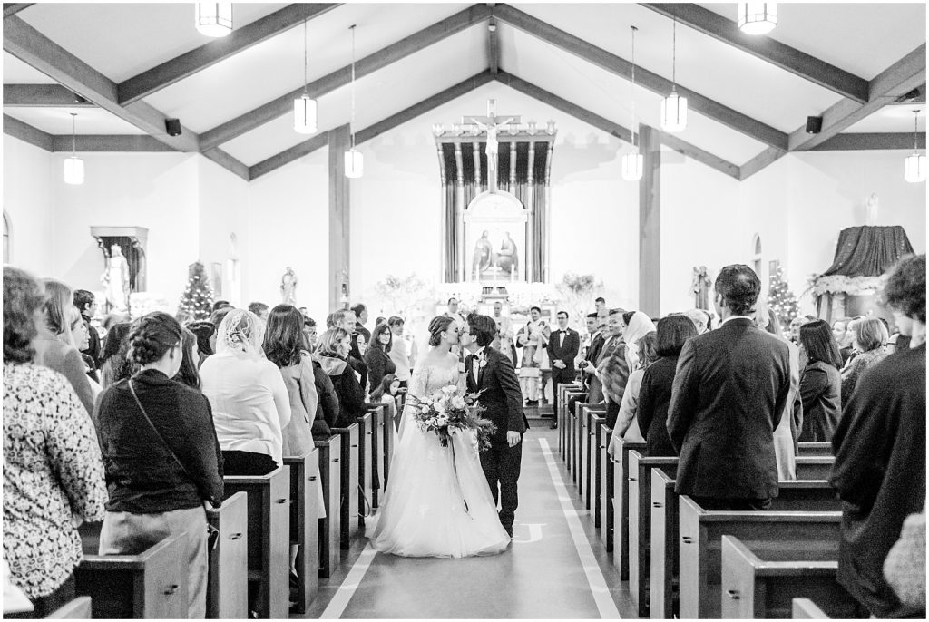 burnaby vancouver wedding bride and groom kiss in the aisle
